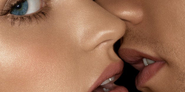 white woman and man in the moment before a kiss