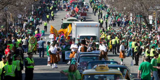 Crowds line the street during the annual St. Patrick's Day Parade in Boston, Sunday, March 18, 2012. (AP Photo/Michael Dwyer)