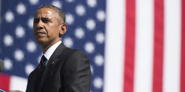 US President Barack Obama speaks during an event marking the 50th Anniversary of the Selma to Montgomery civil rights marches at the Edmund Pettus Bridge in Selma, Alabama, on March 7, 2015. US President Barack Obama rallied a new generation of Americans to the spirit of the civil rights struggle, warning their march for freedom 'is not yet finished.' In a forceful speech in Selma, Alabama on the 50th anniversary of the brutal repression of a peaceful protest, America's first black president denounced new attempts to restrict voting rights. AFP PHOTO/ SAUL LOEB (Photo credit should read SAUL LOEB/AFP/Getty Images)