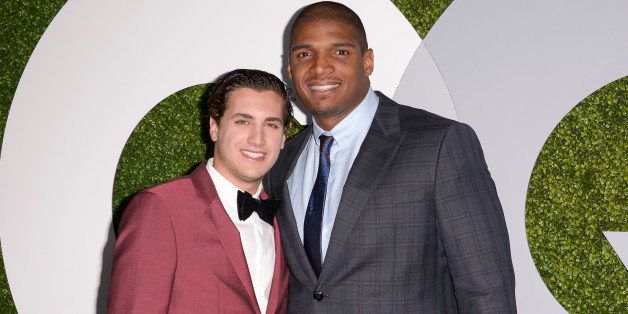 Honoree Michael Sam, right, and his boyfriend Vito Cammisano attend the 2014 GQ Men of the Year Party at Chateau Marmont in Los Angeles on Thursday, Dec. 4, 2014. (Photo by Dan Steinberg/Invision/AP Images)