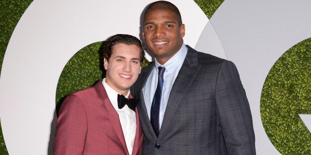 Honoree Michael Sam, right, and his boyfriend Vito Cammisano attend the 2014 GQ Men of the Year Party at Chateau Marmont in L
