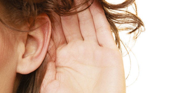 Part of head woman female hand to ear listening isolated on white background. Gossip