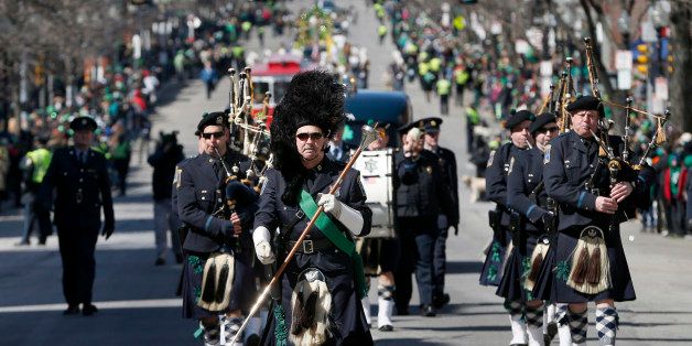 The Boston Police Gaelic Column marches in the annual St. Patrick's Day parade in the South Boston neighborhood of Boston, Sunday, March 16, 2014. (AP Photo/Michael Dwyer)
