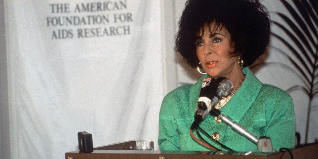 British-born American actress Elizabeth Taylor, veteran campaigner and film star attends a conference on AIDS in Florence, Italy in June 1991. Also attending the conference were leading AIDS researchers from around the world, including French researcher Luc Montagner, and Robert Gallo from America. (AP Photo/Brunellesco Torrini)