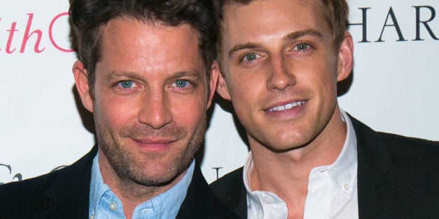 NEW YORK, NY - APRIL 23: Interior designer Nate Berkus and Jeremiah Brent attend the Charm & Chain Kaleidoscope Collection Launch at Up & Down on April 23, 2014 in New York City. (Photo by J Carter Rinaldi/Getty Images)