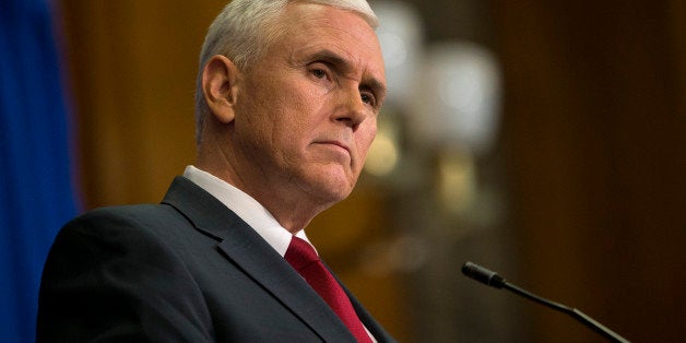 INDIANAPOLIS, IN - MARCH 31: Indiana Gov. Mike Pence speaks during a press conference March 31, 2015 at the Indiana State Library in Indianapolis, Indiana. Pence spoke about the state's controversial Religious Freedom Restoration Act which has been condemned by business leaders and Democrats. (Photo by Aaron P. Bernstein/Getty Images)