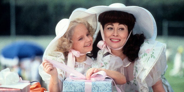 Actress Faye Dunaway and Mara Hobel on the set of Paramount Pictures movie ' Mommie Dearest' in 1981. (Photo by Michael Ochs Archives/Getty Images)