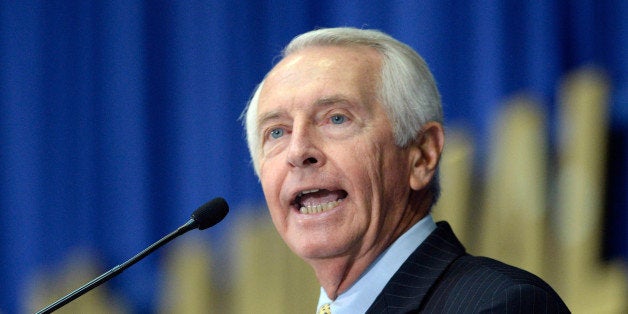 FILE - In an Aug. 22, 2013 file photo, Kentucky Gov. Steve Beshear addresses the audience at the 50th annual Kentucky Country Ham Breakfast in Louisville, Ky. The Democratic governor is touting Kentuckyâs neutrality on labor matters as âa positive sales pointâ for attracting automotive investment, particularly in contrast to the turmoil in Tennessee, where GOP officials have pulled out all the stops in what may yet be an unsuccessful effort to keep the United Auto Workers from gaining collective bargaining rights Volkswagenâs plant in Chattanooga. (AP Photo/Timothy D. Easley, File)