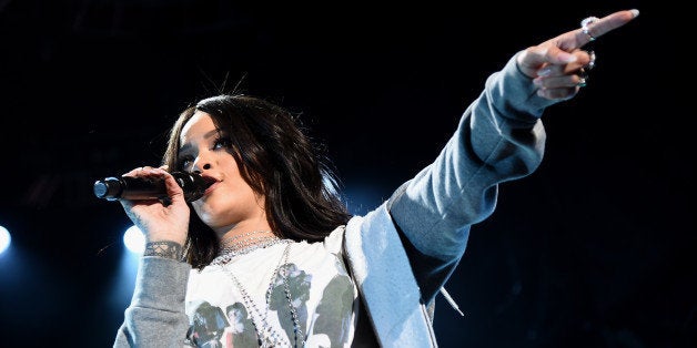 INDIANAPOLIS, IN - APRIL 04: Rihanna performs onstage during the Coke Zero Countdown at the NCAA March Madness Music Festival - Day 2 at White River State Park on April 4, 2015 in Indianapolis, Indiana. (Photo by Michael Loccisano/Getty Images for Turner)