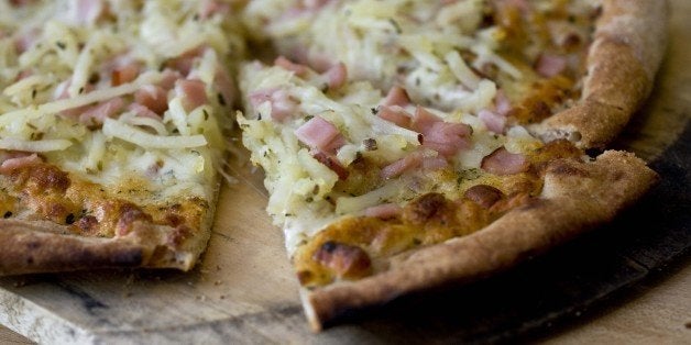 **FOR USE WITH AP LIFESTYLES** This photo taken May 10, 2009 shows a basic frozen cheese pizza which is an easy, and afforda