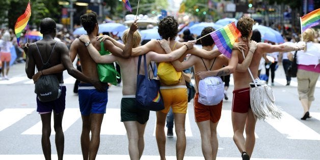 Marchers walk down 5th Avenue during the 2012 New York Gay Pride parade in New York on June 24, 2012. The 43rd-annual parade with more than 500,000 people is part of Gay Pride week. AFP PHOTO/TIMOTHY A. CLARY (Photo credit should read TIMOTHY A. CLARY/AFP/GettyImages)