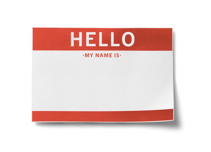 Red name badge with the words, 'HELLO, my name is' printed in big letters.