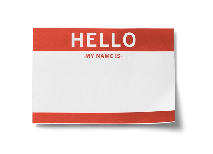 Red name badge with the words, 'HELLO, my name is' printed in big letters.