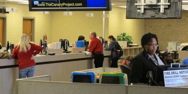 Motorists visit a South Carolina Department of Motor Vehicles office in Columbia, S.C., on February 27, 2014. From March 10 t