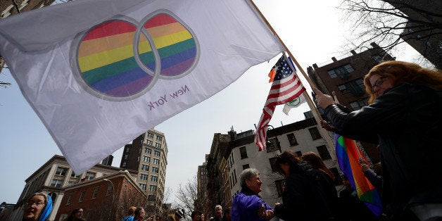 Marriage equality supporters take part in a march and rally ahead of US Supreme Court arguments on legalizing same-sex marriage in New York on March 24, 2013. The US Supreme Court will consider the divisive issue of legalizing same-sex marriage, in a hotly anticipated hearing on March 26 and 27 that could have historic consequences for American family life. The Supreme Court will hear oral arguments on two cases related to the right to marry. These two cases, which concern the discriminatory Defense of Marriage Act (DOMA) and Californiaâs Proposition 8, are fundamentally about whether gay and lesbian Americans can enjoy the same freedoms and opportunities as everyone else. AFP PHOTO/Emmanuel Dunand (Photo credit should read EMMANUEL DUNAND/AFP/Getty Images)