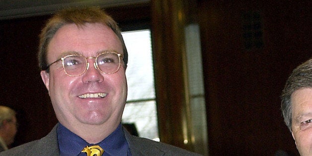 Rep. Randy Boehning, R-Fargo, left, and Rep. Gary Kreidt, R-New Salem, both sport identical yellow smile ties at the Capitol in Bismarck, N.D., Thursday, April 10, 2003. The two men wore the ties to participate in daffodil day. On daffodil day legislators wear yellow in honor of spring and the end of the session. (AP Photo/Will Kincaid)