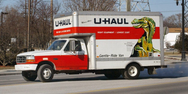 MORTON GROVE, IL - JANUARY 23: A U-Haul truck departs from a U-Haul store January 23, 2003 in Morton Grove, Illinois. Reno, Nevada-based U-Haul Co. is discussing debt restructuring. (Photo by Tim Boyle/Getty Images)