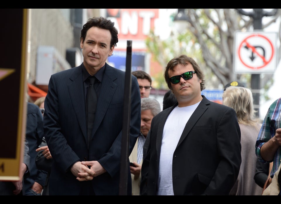 Actors John Cusack (L) and Jack Black at