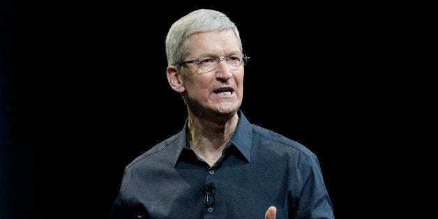FILE - In this June 2, 2014, file photo, Apple CEO Tim Cook speaks at the Apple Worldwide Developers Conference event in San