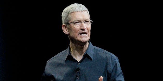 FILE - In this June 2, 2014, file photo, Apple CEO Tim Cook speaks at the Apple Worldwide Developers Conference event in San Francisco. Cook says that so-called "religious objection" legislation being introduced in a number states like Indiana and Texas is dangerous. In an op-ed piece for The Washington Post, Cook said that the bills under consideration "have the potential to undo decades of progress toward greater equality." (AP Photo/Jeff Chiu, File)