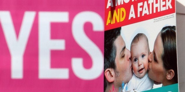 TO GO WITH AFP STORY BY CONOR BARRINS Banners encouraging voters to support the Yes and the No campaign in the Irish same-sex marriage referendum are seen in Dublin on May 13, 2015. Ireland could become the first country in the world to vote for same-sex marriage in a historic referendum on May 22 in this traditionally Catholic nation. Voters will be asked whether or not to add an article to the Irish constitution saying: 'Marriage may be contracted in accordance with law by two persons without distinction as to their sex.' AFP PHOTO / PAUL FAITH (Photo credit should read PAUL FAITH/AFP/Getty Images)