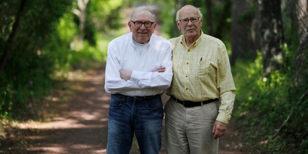 Bill Novak, left, and partner Norman MacArthur pose for a photograph near the couple's home, Friday, May 22, 2015, in Erwinna, Pa. The couple who were legally recognized as father and son has gotten a judge to vacate the adoption now that same-sex partners can get married in Pennsylvania. (AP Photo/Matt Slocum)