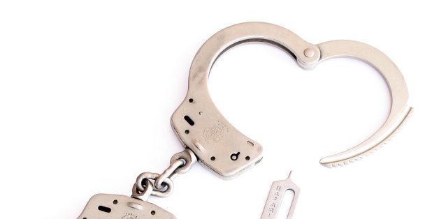 Smith & Wesson Handcuffs with Safariland handcuff key.