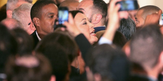 WASHINGTON, DC - JUNE 24: A heckler is removed after interrupting U.S. President Barack Obama during at reception for LGBT Pride Month in the East Room of the White House June 24, 2015 in Washington, DC. Obama delivered remarks highlighting the progress made by gay, lesbian, bisexual and transgender people in the areas of insurance, military service, marriage and other rights. (Photo by Chip Somodevilla/Getty Images)