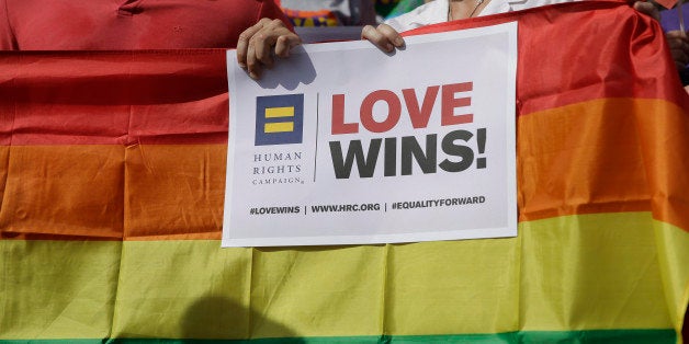 Supporters of the U.S. Supreme Courts ruling on same-sex marriage gather on the step of the Texas Capitol for a news conference celebrating marriage equality and looking to important work ahead, Monday, June 29, 2015, in Austin, Texas. The Supreme Court declared Friday that same-sex couples have a right to marry anywhere in the United States. (AP Photo/Eric Gay)