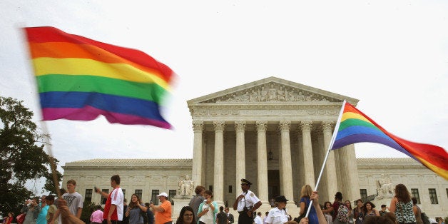 WASHINGTON, DC - JUNE 26: People celebrate in front of the U.S. Supreme Court after the ruling in favor of same-sex marriage June 26, 2015 in Washington, DC. The high court ruled that same-sex couples have the right to marry in all 50 states. (Photo by Mark Wilson/Getty Images)