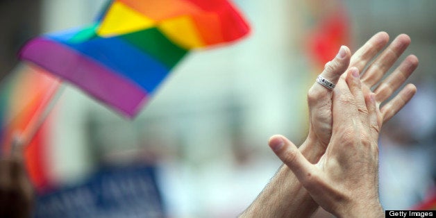 LGBT rinbow flag and clapping hands.