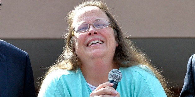 Rowan County Clerk Kim Davis pauses as she speaks after being released from the Carter County Detention Center, Tuesday, Sept. 8, 2015, in Grayson, Ky. Davis, the Kentucky county clerk who was jailed for refusing to issue marriage licenses to gay couples, was released Tuesday after five days behind bars. (AP Photo/Timothy D. Easley)