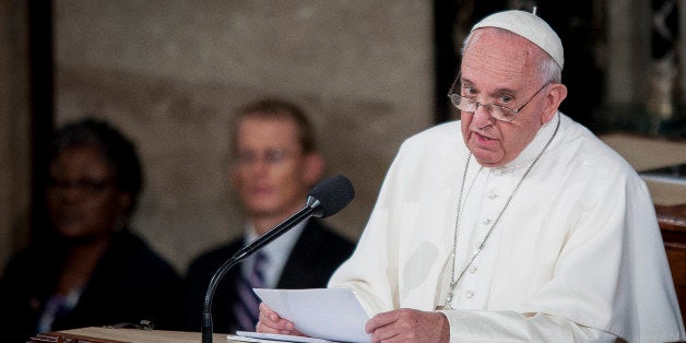 Pope Francis speaks to a joint meeting of Congress in the House Chamber at the U.S. Capitol in Washington, D.C., U.S., on Thursday, Sept. 24, 2015. Pope Francis, the first pontiff to address U.S. Congress, is preaching to a less-than-harmonious congregation as he faces a Congress riven by disputes over issues closest to his heart: income inequality, immigration and climate change. Photographer: Pete Marovich/Bloomberg via Getty Images 