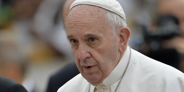 Pope Francis arrives for his weekly general audience at St Peter's square on September 30, 2015 at the Vatican. AFP PHOTO / ANDREAS SOLARO (Photo credit should read ANDREAS SOLARO/AFP/Getty Images)