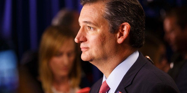 Senator Ted Cruz, a Republican from Texas and 2016 presidential candidate, listens during an interview in the spin room after the Republican presidential debate at the Ronald Reagan Presidential Library in Simi Valley, California, U.S., on Wednesday, Sept. 16, 2015. The main debate of the top 11 GOP contenders in the polls follows the 'kids' table' debate of candidates who didn't make the cut. Photographer: Patrick T. Fallon/Bloomberg via Getty Images 