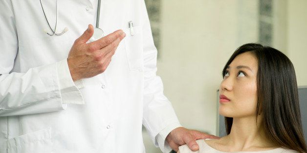 Woman receiving bad news from doctor, cropped