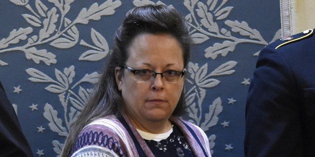 Kim Davis, the Rowan County clerk in Kentucky, arrives before US President Barack Obama delivers the State of the Union Address during a Joint Session of Congress at the US Capitol in Washington, DC, January 12, 2016. Kim Davis, a born-again Christian, was jailed briefly in September 2015 for contempt of court after refusing to issue marriage licenses due to her opposition to gay marriage, which the Supreme Court legalized across the United States in June. Barack Obama will give his final State of the Union address, perhaps the last big opportunity of his presidency to sway a national audience and frame the 2016 election race. AFP PHOTO / SAUL LOEB / AFP / SAUL LOEB (Photo credit should read SAUL LOEB/AFP/Getty Images)