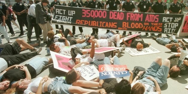 SAN DIEGO, CA - AUGUST 13: Members of Act Up stage a protest in front of the Convention center, protesting GOP policies on AI