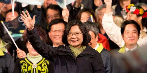 TAIPEI, TAIWAN - JANUARY 16: President-elect Tsai Ing-wen waves supporters at DPP headquarter on January 16, 2016 in Taipei, Taiwan. Tsai Ing-wen, the chairwoman of the opposition Democratic Progressive Party, won the presidential election to become the Taiwan's first female leader. (Photo by Ashley Pon/Getty Images)