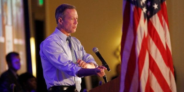 FILE - In this Jan. 16, 2016 file photo, Democratic presidential candidate, former Maryland Gov. Martin O'Malley rolls up his shirt sleeve while he speaks in Charleston, S.C. In Iowaâs leadoff presidential caucuses, OâMalley could finally be a player. Thatâs probably not because of any hidden depths of support for the low-polling former Maryland governor. Rather, the quirks of the Iowa process mean that candidates must have a minimum level of support in each of the stateâs nearly 1,700 voting precincts. If OâMalley backers canât reach the threshold they will have to select another candidate. (AP Photo/Mic Smith, File)