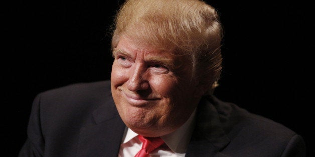 Donald Trump, president and chief executive of Trump Organization Inc. and 2016 Republican presidential candidate, attends a campaign event at the Orpheum Theater in Sioux City, Iowa, U.S., on Sunday, Jan. 31, 2016. Donald Trump has overtaken Ted Cruz in the final days before Iowa's caucuses, with the fate of the race closely tied to the size of Monday evening's turnout, especially among evangelical voters and those attending for the first time. Photographer: Luke Sharrett/Bloomberg via Getty Images 