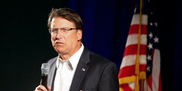Governor of North Carolina Pat McCrory introduces candidate for U.S. Senate Thom Tillis (R-NC) at a campaign stop in Raleigh, North Carolina October 29, 2014. REUTERS/Chris Keane (UNITED STATES - Tags: POLITICS)
