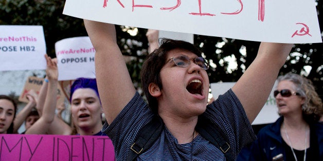 Duke University student Sydney Roberts shouts during a protest against House Bill 2 on Thursday, March 24, 2016, outside of the Governor's Mansion on North Blount Street in downtown Raleigh, N.C. (Jill Knight/Raleigh News & Observer/TNS via Getty Images)