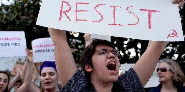 Duke University student Sydney Roberts shouts during a protest against House Bill 2 on Thursday, March 24, 2016, outside of t