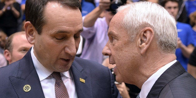DURHAM, NC - MARCH 05: Head coach Mike Krzyzewski (L) of the Duke Blue Devils talks with head coach Roy Williams of the North