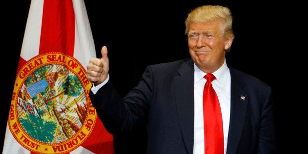 Republican U.S. presidential candidate Donald Trump gestures during a campaign rally in Tampa, Florida, U.S. June 11, 2016. REUTERS/Scott Audette