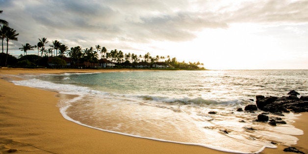 Ocean waves washing up on tropical beach