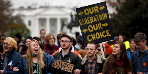 Students participate in the 'Our Generation, Our Choice' protest near the White House in Washington November 9, 2015. The Monday march to highlight race, climate, and immigration issues was timed to mark exactly one year until the 2016 U.S. presidential election, according to protesters. REUTERS/Jonathan Ernst