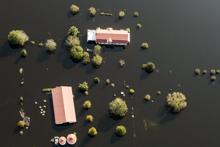 A hog farm surround by floodwater is seen in this aerial photograph taken above New Bern, North Carolina, on Sept. 21.