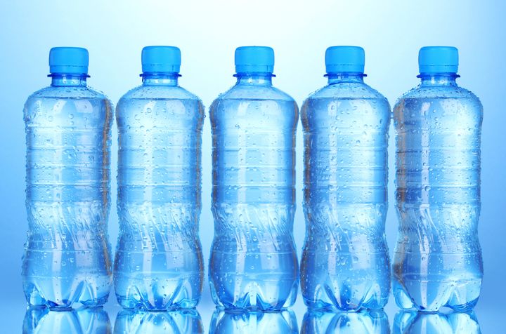 plastic bottles of water on...